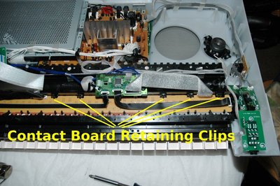 contact board retaining clips