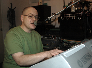 Dan singing & playing at the keyboard.