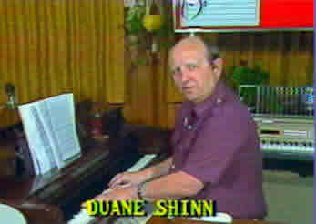 Duane Shinn sitting at Piano Keyboard