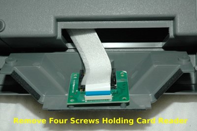 remove four screws holding card reader